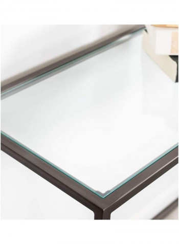 طاولة كونسول ذات إطار معدني و سطح زجاجي بني / شفاف