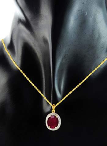 18 Karat Gold 0.12 Carat Diamond And Oval Cut Ruby Pendant Necklace