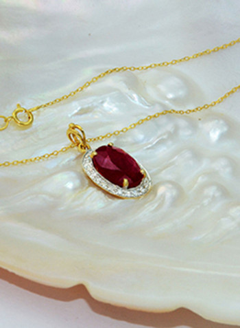 18 Karat Gold 0.12 Carat Diamond And Oval Cut Ruby Pendant Necklace