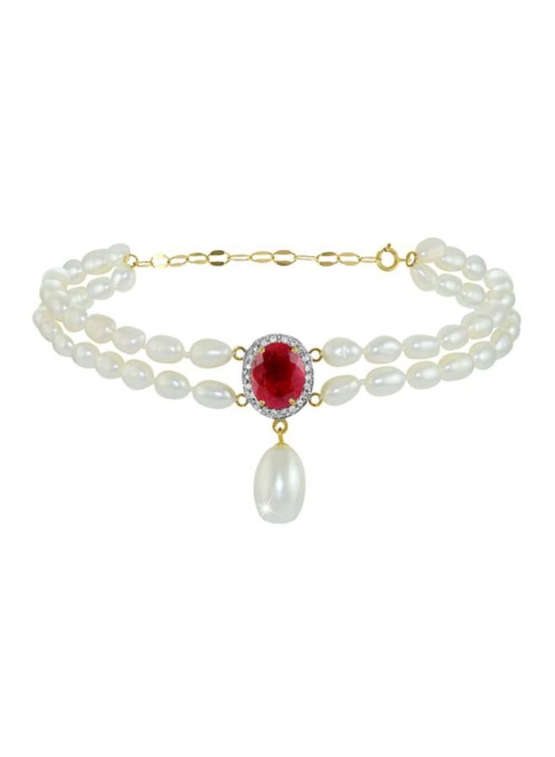 18 Karat Gold Diamonds Oval Ruby And Pearl Bracelet