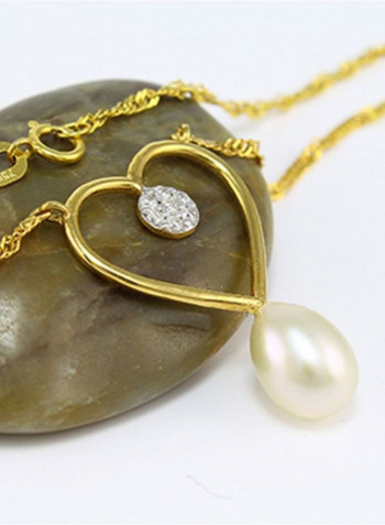 18 Karat Gold Diamond And Pearl Studded Solitaire Necklace