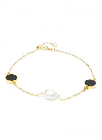 18 Karat Gold Black Onyx And Pearl Three Stone Bracelet