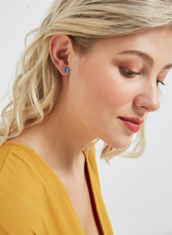18 Karat White Gold Blue Topaz Oval Earrings