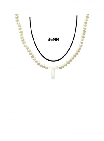 18 Karat Gold Pearls Strand Letter T Necklace