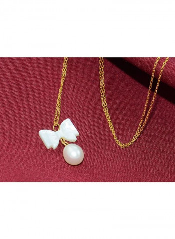 18 Karat Gold Pearl And Bow Mother Of Pearl Necklace